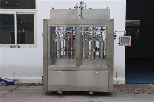 Màquina automàtica d'ompliment d'ampolles de melmelada