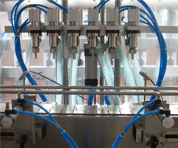 Màquina automàtica de farciment de líquids de sis capçals